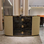 Curved Black and Cream Sideboard Cabinet with Three Central Drawers Textured Side Panels Gold Monogram Pulls and Rounded Profile